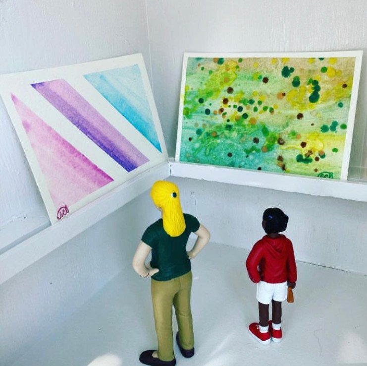 Tiny visitors viewing the tiny art